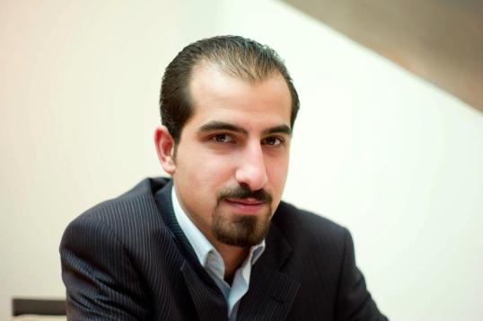 A salute to Bassel al-Safadi (photo) in his detention and Aliaa Khalifa in her hospital
